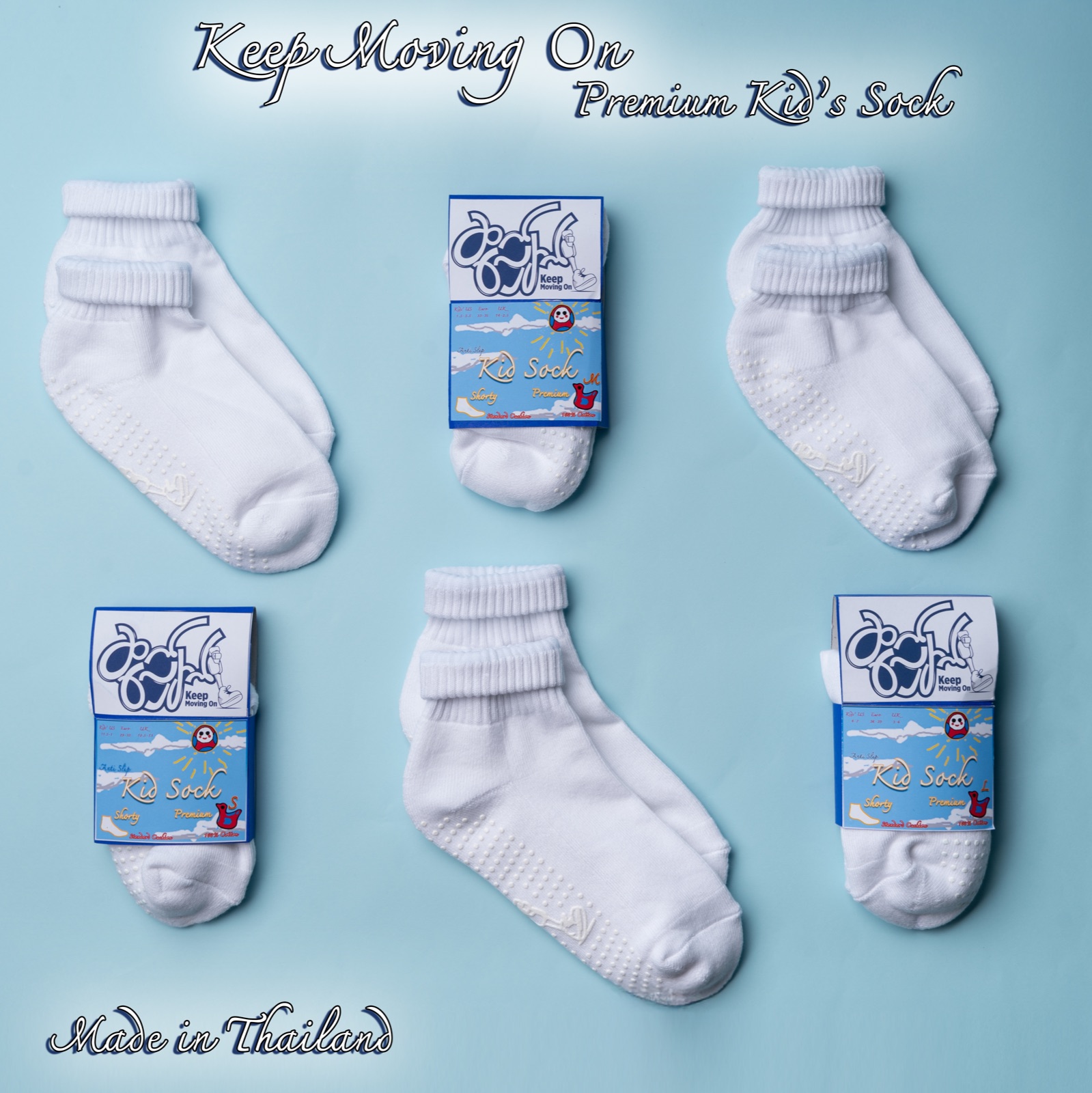 Three boxed kid's socks floating on a teal background.